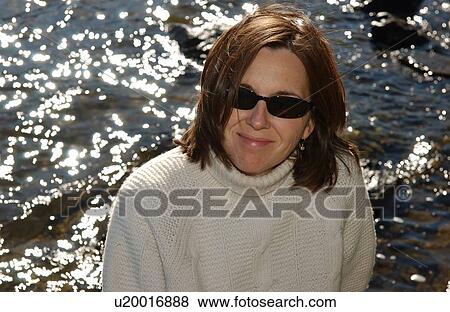 Brunette Smiling at Camera View Large Photo Image Stock Photo - Brunette Smiling at Camera. Fotosearch