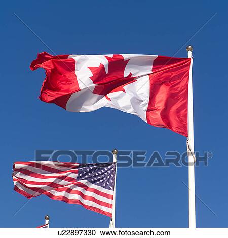 Canadian and American Flag Toronto Ontario Canada View Large Photo Image Stock Image - Canadian and American Flag Toronto Ontario Canada. Fotosearch