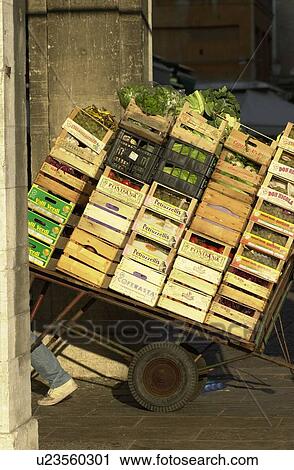 Cart loaded with crates of vegetables View Large Photo Image Stock Image - Cart loaded with crates of vegetables. Fotosearch