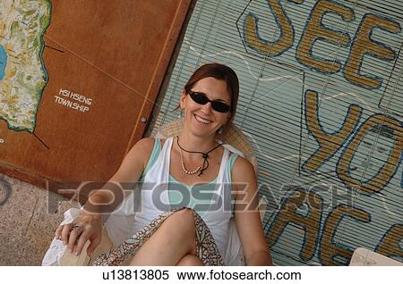 Stock Photography - Caucasian woman wearing sunglasses. Fotosearch