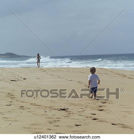 Stock Image - Children at the Beach. Fotosearch