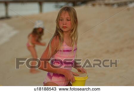 Close-up of a young girl View Large Photo Image Stock Image - Close-up of a young girl. Fotosearch