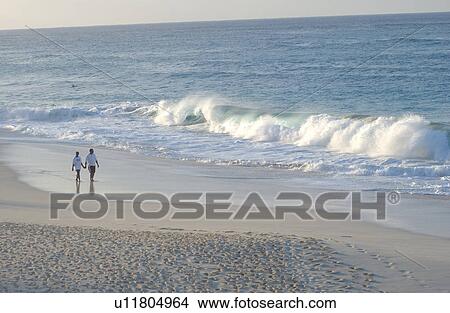 Couple on beach in Bahamas View Large Photo Image Picture - Couple on beach in Bahamas. Fotosearch