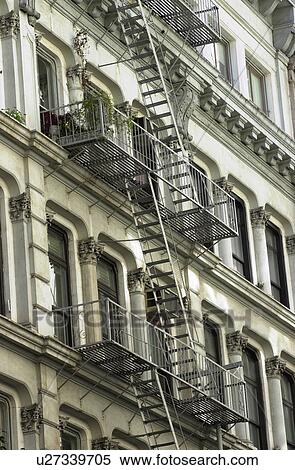 Stock Photography - Fire Escape, Buildings in New York City. Fotosearch