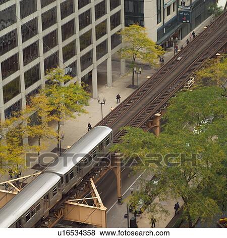 High angle view of a CTA Train running on tracks View Large Photo Image Stock Photo - High angle view of a CTA Train running on tracks. Fotosearch