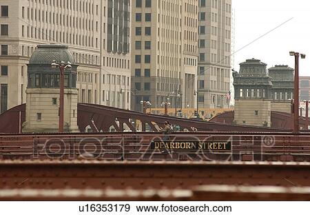 Stock Photo - High rise buildings near a bridge in Chicago. Fotosearch