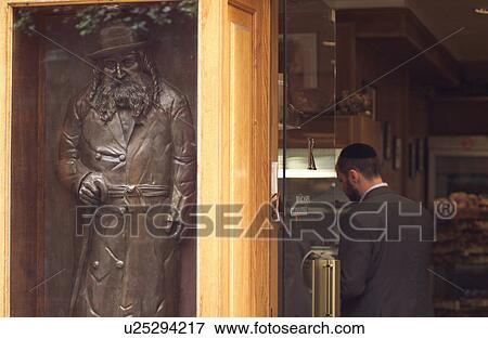 Jewish man standing in a building in Paris, France View Large Photo Image Stock Photo - Jewish man standing in a building in Paris, France. Fotosearch