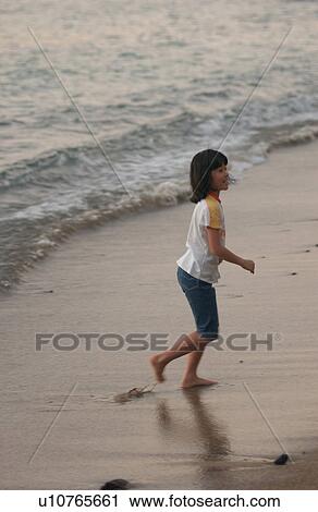 Kids playing on beach - Hawaii View Large Photo Image Stock Image - Kids playing on beach - Hawaii. Fotosearch