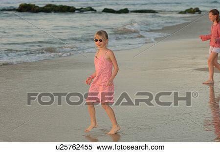 Kids playing on beach - Hawaii View Large Photo Image Stock Photography - Kids playing on beach - Hawaii. Fotosearch