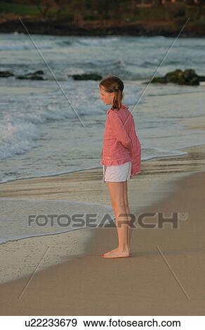 Kids playing on beach View Large Photo Image Stock Photo - Kids playing on beach. Fotosearch