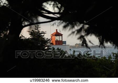 Stock Photograph - Lighthouse on Broken Islands, Pacific Rim National Park, Vancouver Island, Canada. Fotosearch