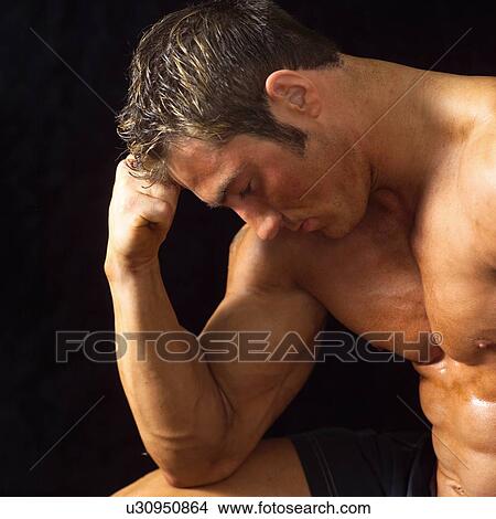Male bodybuilder posing View Large Photo Image Picture - Male bodybuilder posing. Fotosearch