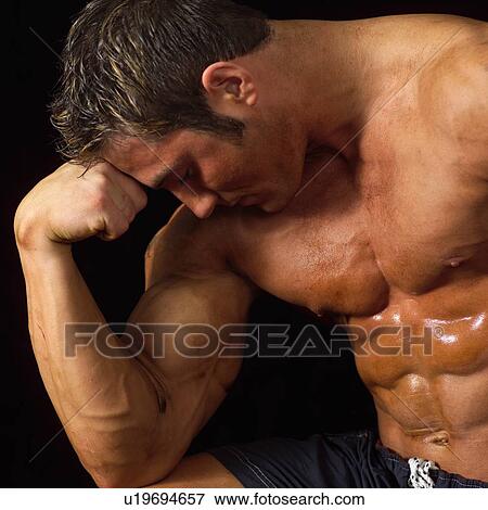 Stock Photo - Male bodybuilder posing. Fotosearch