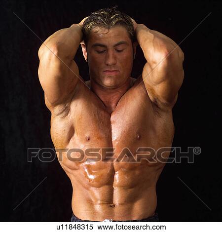 Male bodybuilder posing View Large Photo Image Stock Photography - Male bodybuilder posing. Fotosearch