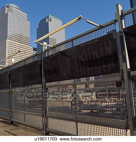 Stock Image - Memorial sign on fence surrounding the World Trade Center site, New York City. Fotosearch