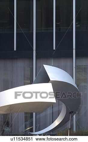 Modern metal sculpture in front of an office building in Montreal, Canada View Large Photo Image Stock Image - Modern metal sculpture in front of an office building in Montreal, Canada. Fotosearch