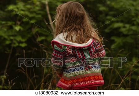 Stock Image - Rear view of a young girl. Fotosearch