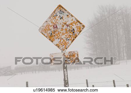 Road sign covered with snow in Alberta Canada View Large Photo Image Stock Photography - Road sign covered with snow in Alberta Canada. Fotosearch