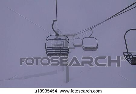 Picture - Ski Lift in Fog. Fotosearch