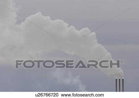Smoke coming out of a chimney in Alberta Canada View Large Photo Image Stock Image - Smoke coming out of a chimney in Alberta Canada. Fotosearch