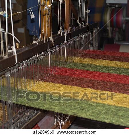 Stock Photo - Textiles being manufactured. Fotosearch