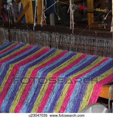 Stock Photography - Textiles being manufactured. Fotosearch