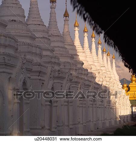 Stock Image - The Shwedagon Paya Temple. Fotosearch