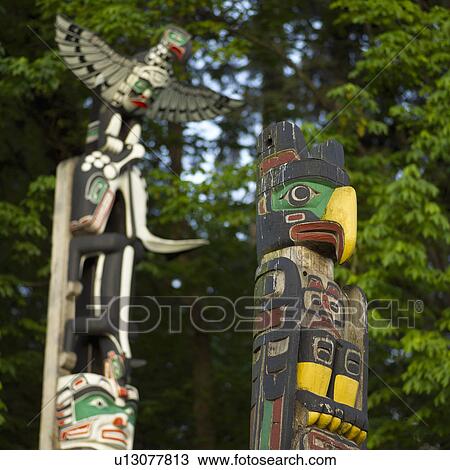 Stock Image - Totem Poles - Stanley Park, Vancouver, British Columbia. Fotosearch