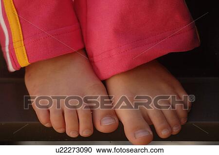 Stock Image - Two bare feet. Fotosearch