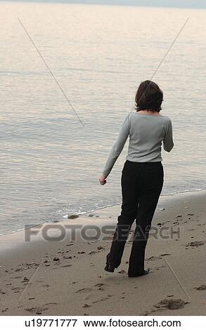 Woman on Beach View Large Photo Image Stock Photo - Woman on Beach. Fotosearch