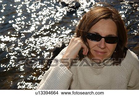 Woman with Hand at Her Cheek View Large Photo Image Picture - Woman with Hand at Her Cheek. Fotosearch
