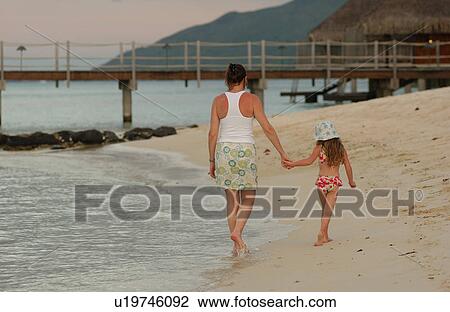 Stock Image - Young Girl and Mother. Fotosearch