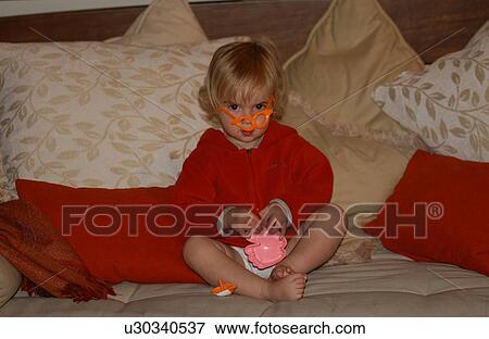 Stock Photo - Young Girl with Goofy Glasses. Fotosearch