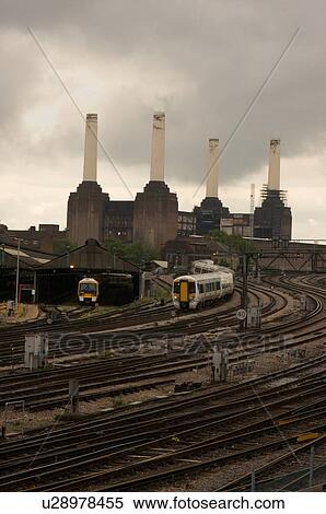 Stock Photography - Battersea power stationwith railway lines in foreground. Fotosearch