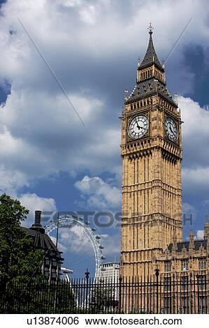 Big Ben in afternoon sun, with London Eye in background View Large Photo Image Stock Photograph - Big Ben in afternoon sun, with London Eye in background. Fotosearch