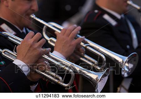 Detail of brass band instruments, with two trumpets View Large Photo Image Stock Image - Detail of brass band instruments, with two trumpets. Fotosearch