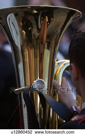 Detail of brass band instruments, with reflection of Italian piazza in euphonium View Large Photo Image Stock Image - Detail of brass band instruments, with reflection of Italian piazza in euphonium. Fotosearch