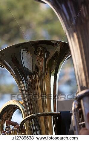 Detail of brass band instruments, with reflections in two euphoniums View Large Photo Image Stock Photo - Detail of brass band instruments, with reflections in two euphoniums. Fotosearch
