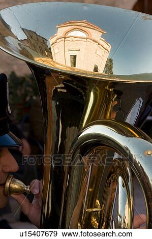 Detail of brass band instruments, with reflection of Italian church in euphonium View Large Photo Image Stock Photo - Detail of brass band instruments, with reflection of Italian church in euphonium. Fotosearch