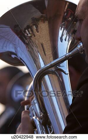 Detail of brass band instruments, with reflection of Italian church in euphonium View Large Photo Image Stock Photo - Detail of brass band instruments, with reflection of Italian church in euphonium. Fotosearch