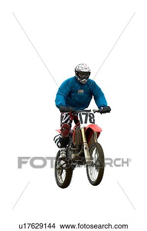 Single motocross rider flying through air, front view View Large Photo Image Picture - Single motocross rider flying through air, front view. Fotosearch