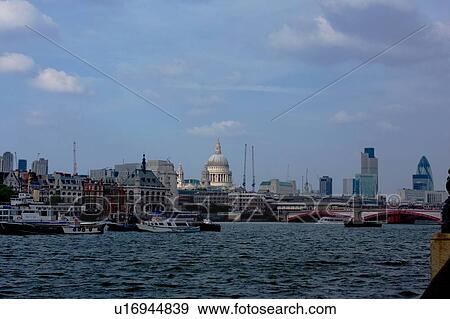 View of Blackfriars Bridge from south bank of River Thames, with Saint Paul's Cathedral in background View Large Photo Image Stock Photo - View of Blackfriars Bridge from south bank of River Thames, with Saint Paul's Cathedral in background. Fotosearch