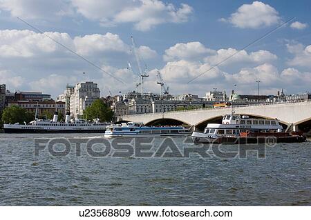 Stock Photo - View of Waterloo Bridge from south bank of River Thames. Fotosearch