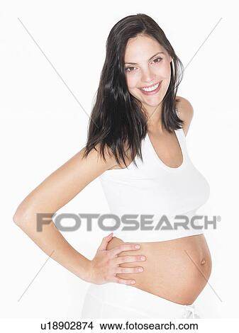 Picture - Pregnant woman smiling. Fotosearch