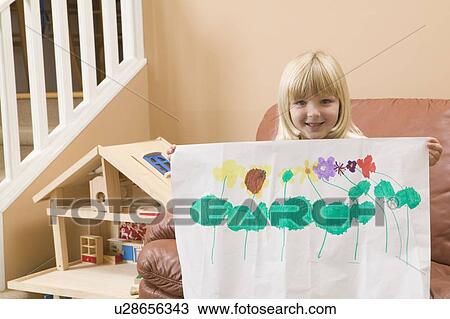 5 year old girl showing off their artwork, B. C. View Large Photo Image Stock Image - 5 year old girl showing off their artwork, B. C.. Fotosearch