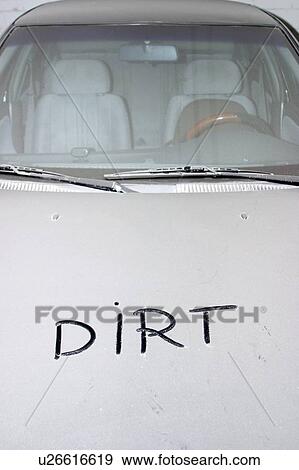 Stock Photo - A dirty car, covered in white dust. Fotosearch