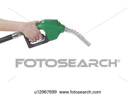 a hand with a gasoline nozzle View Large Photo Image Stock Photo - a hand with a gasoline nozzle. Fotosearch