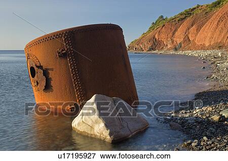 Stock Photo - Ballantyne's Cove and cliffs, Cape Turner, Nova Scotia, Canada. Fotosearch