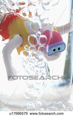 Child's bathtub toy in glass of water View Large Photo Image Stock Photo - Child's bathtub toy in glass of water. Fotosearch