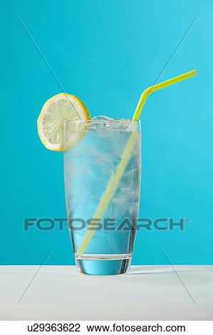Clear glass of water with lemon and drinking straw View Large Photo Image Stock Image - Clear glass of water with lemon and drinking straw. Fotosearch
